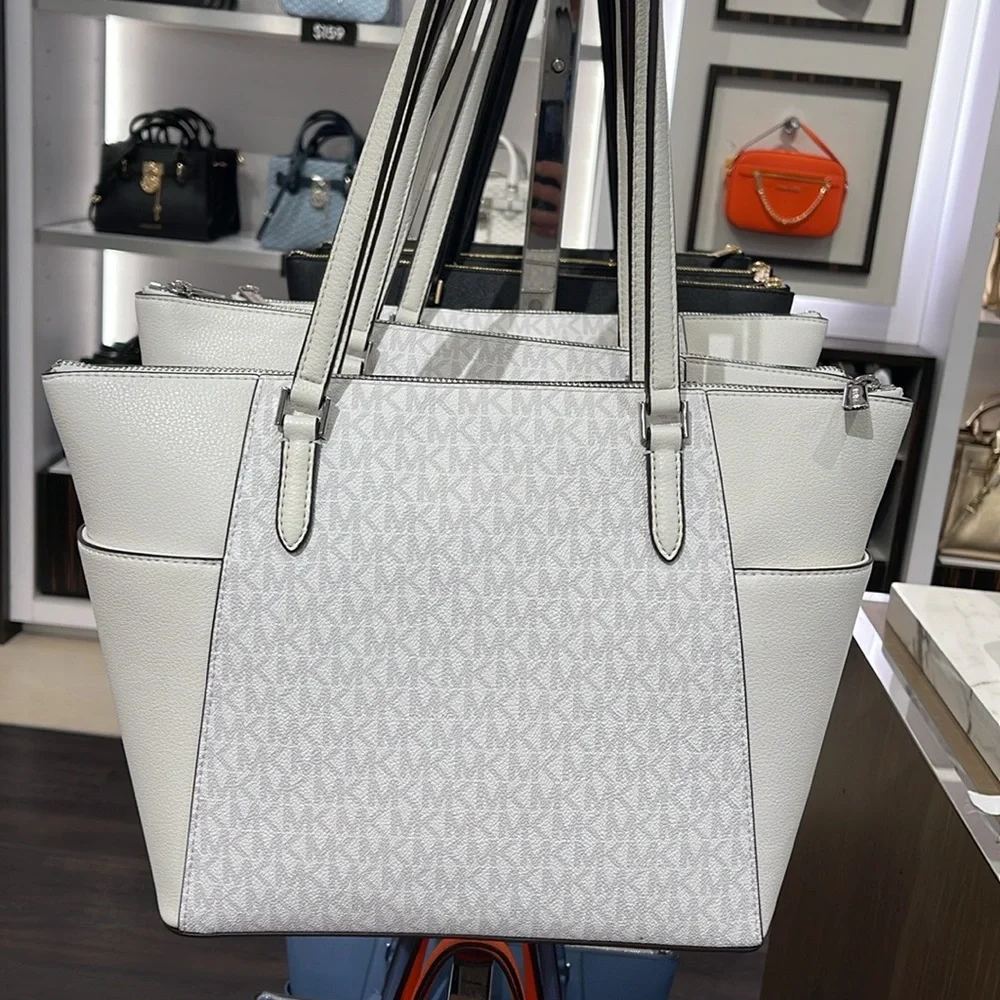 Michael Kors Charlotte Large Logo and Leather Top-Zip Tote Bag
Optic White
NWT - Picture 4 of 16